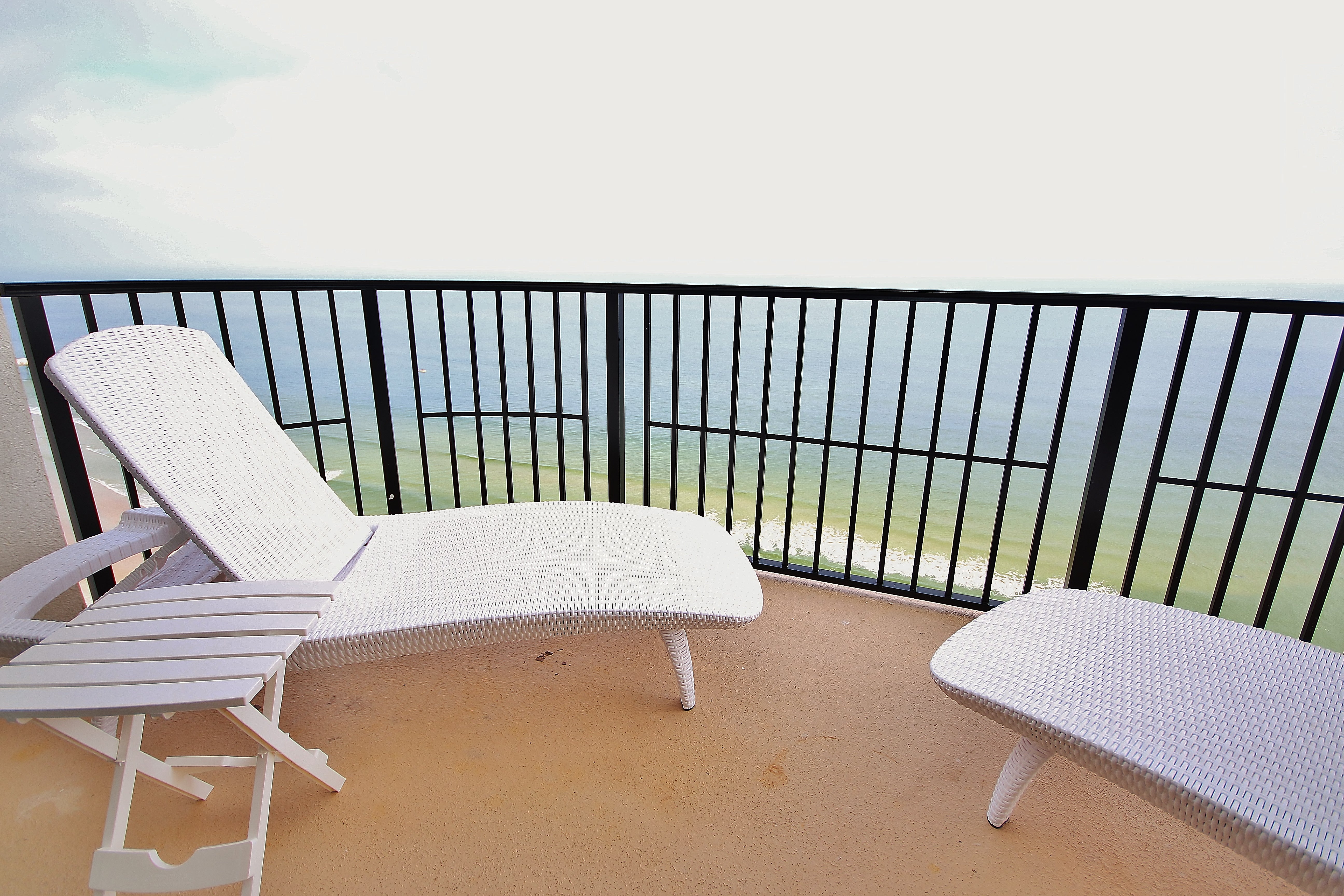 Sun bathe on the furnished balcony